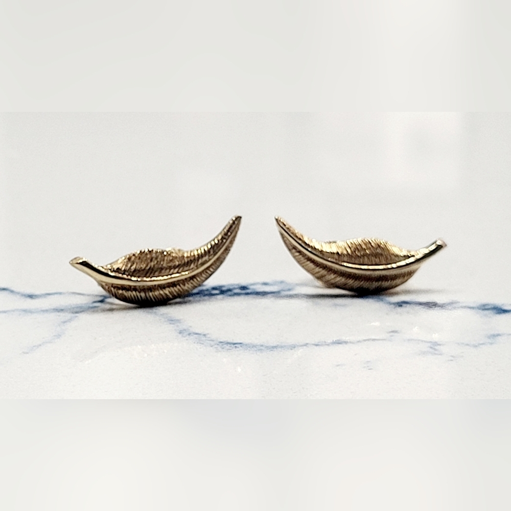 Avon gold feaher clip-on earrings